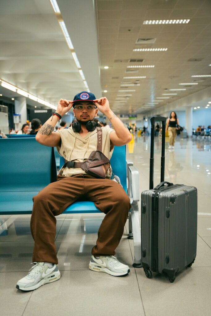 Airport traveller with a suitcase, illustrating the PRTD outside Canada process.
